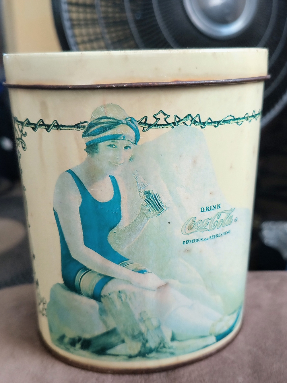 1989 Coca Cola Cream Tin with Teal Illustration
